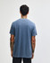 A navy unisex heavyweight cotton T-shirt displayed from the back, featuring a simple design and short sleeves.
