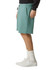 Unisex gym shorts in teal with pockets and a drawstring waistband, worn with white sneakers and socks.