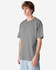 A grey super heavyweight T-shirt displayed on a model, featuring a simple design and straight fit.