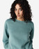 A teal women's crewneck sweatshirt made from fleece, featuring a simple design and a logo.