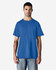 A blue Gildan Light Cotton T-Shirt displayed on a model, featuring a simple design and short sleeves.