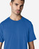 A blue Gildan Light Cotton T-Shirt on a male model, featuring a simple design and a logo.