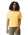 A boxy women's t-shirt in a vibrant yellow colour, featuring short sleeves and a relaxed fit.