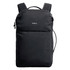 A black backpack with shoulder straps, featuring a front pocket and a logo on the exterior.