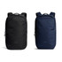 A black and a navy blue Bellroy Via Backpack 20L displayed side by side, featuring a logo and a sleek design.