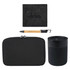 A black tech kit featuring a wireless charger, pen, and a sleek container. Includes a zipped pouch for storage.