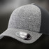 A grey and black trucker cap featuring a textured design and a branded sticker on the brim.
