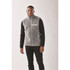Men's Bergen Sherpa fleece vest in light grey, featuring a zip-up front and a chest pocket. Black long-sleeve shirt underneath.