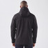 A black softshell jacket with a hood, featuring a logo, shown from the back on a model.