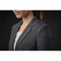 A grey women's blazer with a notch lapel and a single chest pocket, displayed on a model against a dark background.