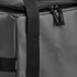 A grey cooler bag featuring a zippered closure, durable straps, and a branding label.