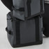 A dark grey cooler bag with sturdy straps, featuring a logo and a compact design for portable use.