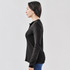A black women's long-sleeve henley shirt, featuring a buttoned neckline and fitted silhouette.
