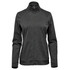 A women's performance jacket in dark grey with a zip front and high collar, featuring a logo on the chest.