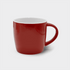 A ceramic mug in bright red with a white interior and a curved handle. It features a logo.