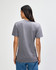 A grey American Apparel tri-blend t-shirt displayed on a model from the back, featuring a simple design and relaxed fit.