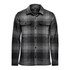 A men's shacket in a black and grey Highland plaid pattern, featuring two chest pockets and long sleeves.