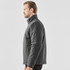 A grey men's Athabasca thermal jacket, featuring a zip closure and a standing collar, displayed from the side.