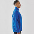 A blue men's full zip jacket with a high collar, featuring a logo on the front.