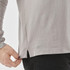 A grey long-sleeve polo shirt with a side slit, featuring a small logo near the hem.
