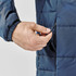 A men's puffer jacket in navy blue, featuring a close-up of a hand adjusting a zippered pocket.