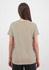 A women's short sleeve tee in a neutral beige colour, featuring a simple design and no visible branding.