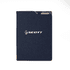 A navy blue notebook with a subtle texture and a logo on the front cover. It has a pocket for cards or notes.