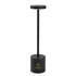 A black rechargeable table lamp with a cylindrical base and a circular top, featuring a logo on the base.