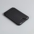 A black magnetic wallet with a slim design, featuring a phone stand and a branding logo on the surface.