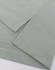 A close-up of a light grey polo shirt featuring short sleeves and a curved hemline. The fabric has a soft texture.