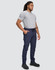 Flexi work pants in navy blue worn by a person standing, paired with a grey t-shirt and black shoes.