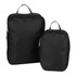 A set of black compression packing cubes in two sizes, featuring zippers and carry handles, with a logo.