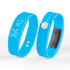 A blue pedometer bracelet with a digital display and a button, featuring a sleek silicone design.