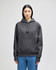 A hooded sweatshirt in dark grey, featuring a front pouch pocket and a subtle logo.