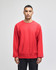 A red Champion Reverse Weave® adult crew sweatshirt displayed on a model. The sweatshirt features a logo tag.