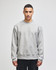 A grey Champion Reverse Weave® adult crew sweatshirt with long sleeves and a logo on the sleeve.