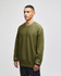 An olive green Champion Reverse Weave® adult crew sweatshirt with a logo displayed on the sleeve.