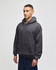 A grey adult crewneck sweatshirt with a hood, featuring a front pocket and a logo on the sleeve.