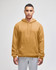 A plain mustard-coloured pullover hooded sweatshirt with a front pocket and a logo. The model is wearing grey pants.