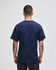 A navy short-sleeve t-shirt viewed from the back, featuring a simple design and a logo.