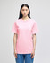 A pink short-sleeve t-shirt displayed on a model, featuring a basic design and a logo on the front.