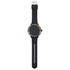 A black smart watch with a round face and a rubber strap, featuring a metallic bezel and a side button.