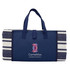 A navy picnic rug with a striped design, featuring sturdy handles and a logo on the front.