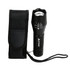 A black Trekk 300 Lumens torch with a textured surface and a carrying pouch. The torch features a strap for convenience.