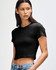 A black crop fitted T-shirt for women, featuring short sleeves and a sleek design. The model wears it with denim jeans.