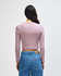 A fitted long-sleeve crop t-shirt in muted pink, featuring a simple design and a back view.