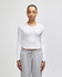 A white long-sleeve fitted crop t-shirt worn by a model, paired with grey trousers. The shirt features a logo.