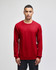 A red long-sleeve t-shirt featuring a logo on the sleeve, presented on a model against a plain background.