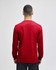 A red long-sleeve t-shirt from the back, featuring fitted sleeves and a simple design, with a logo visible.