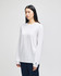 A white long-sleeve t-shirt featuring a logo on the sleeve, displayed on a model against a plain background.